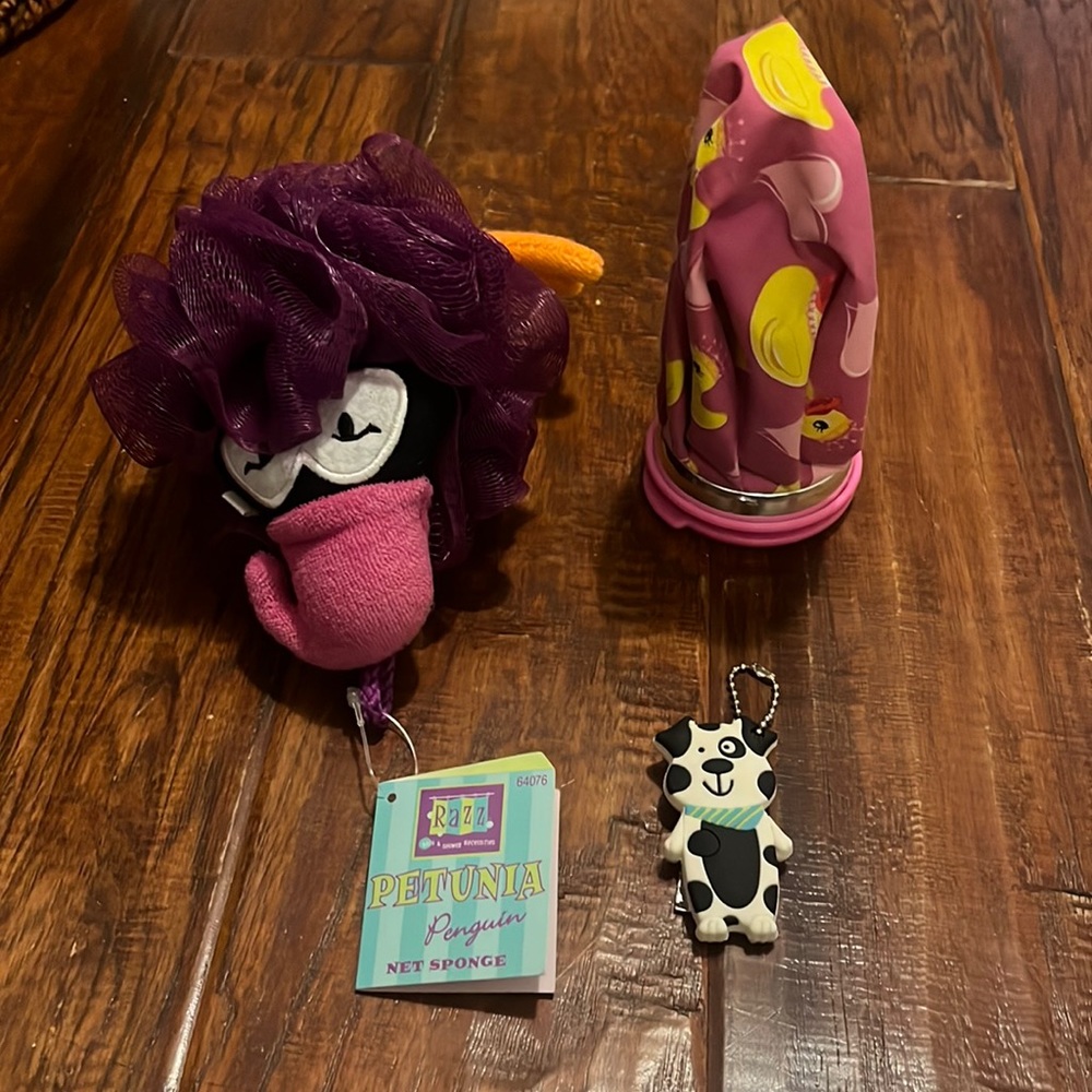 Cool Queen Ducks Pink Ice Pack, Razzables Penguin Sponge, & Puppy Nail Clipper.